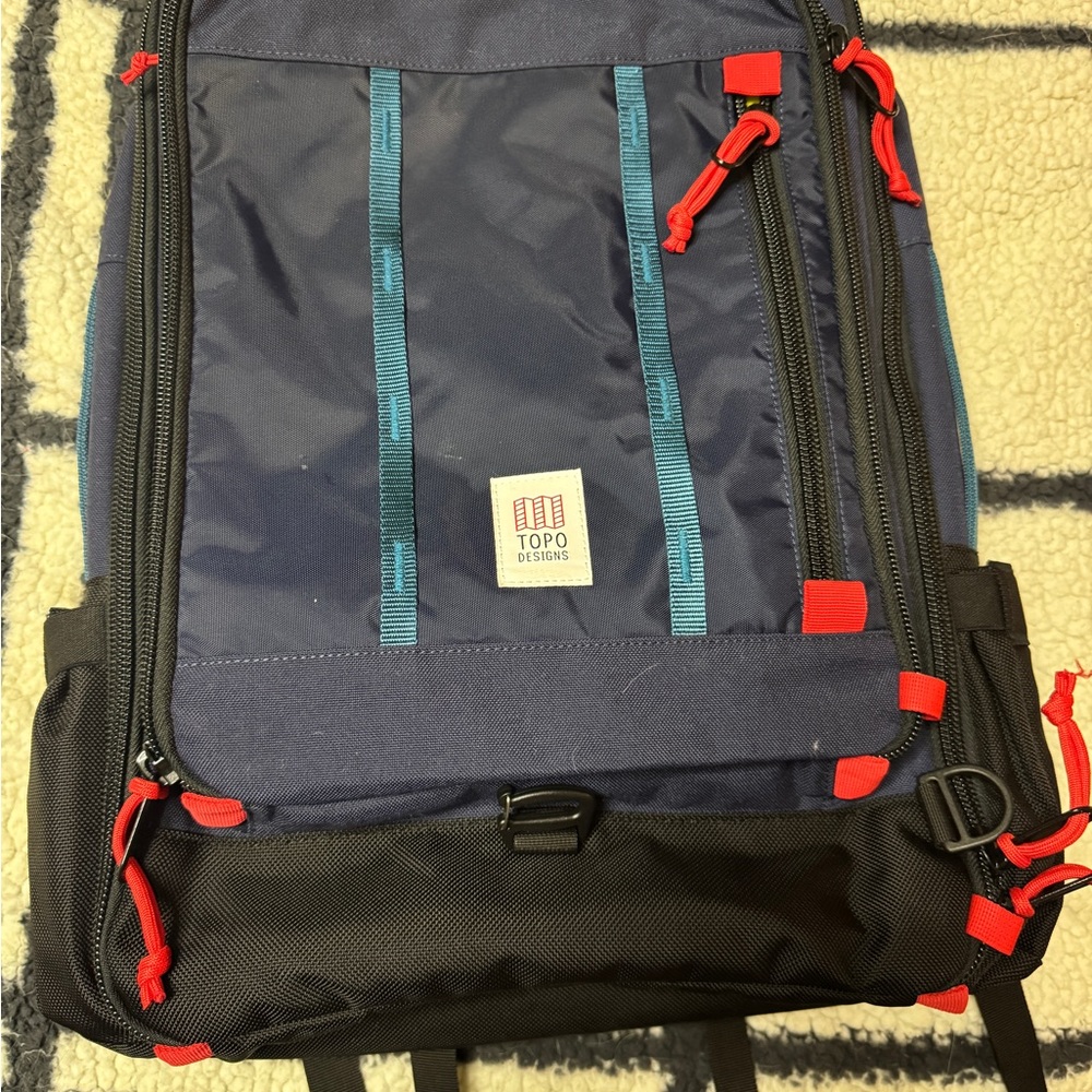 Topo Designs Blue and Black Backpack with Durable Material